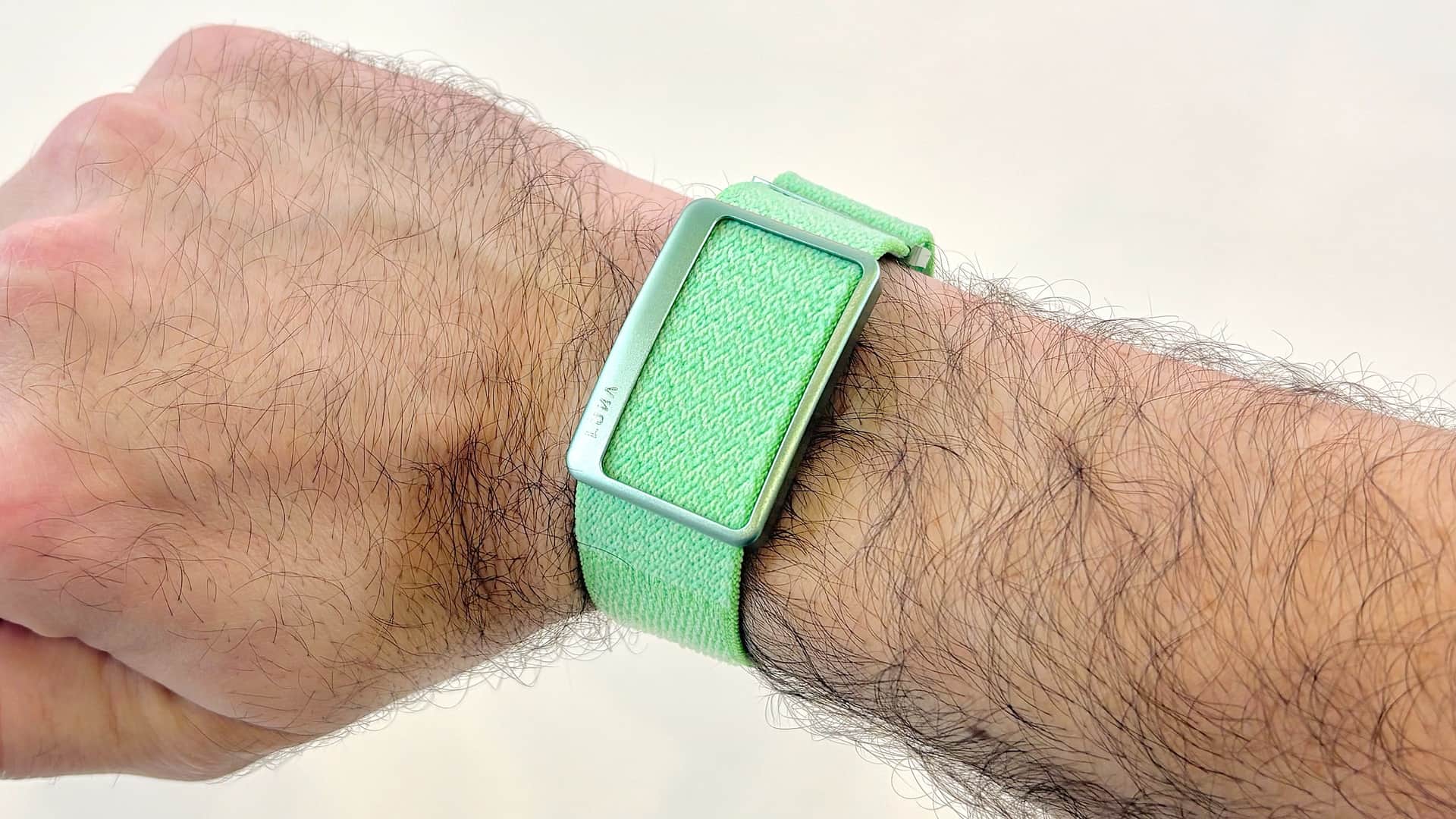Close-up of the Garmin Cirqa screen-free tracker next to the Luna Band at IFA 2026 in Berlin — Image credit: Dan Bracaglia/Tom's Guide