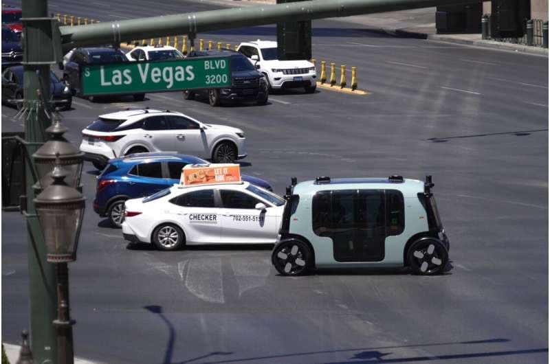 An Amazon Zoox taxi with no steering wheel drives down the Las Vegas strip, Thursday, July 30, 2026. Credit: AP Photo/Ty ONeil