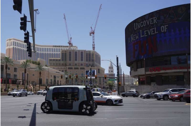 A Zoox taxi with no steering wheel drives down the Las Vegas strip on Thursday, July 30, 2026 Credit: AP photo/Ty ONeil