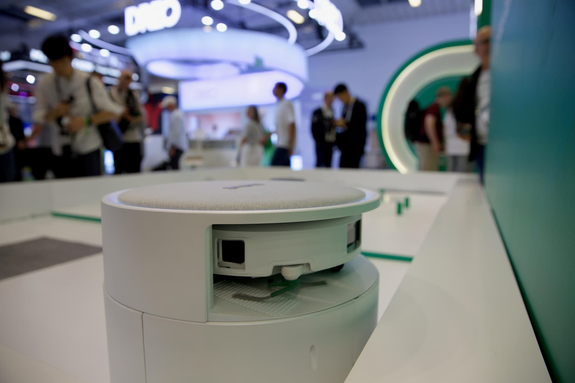 The Roomba Plus 757 sits on top of the main robot.