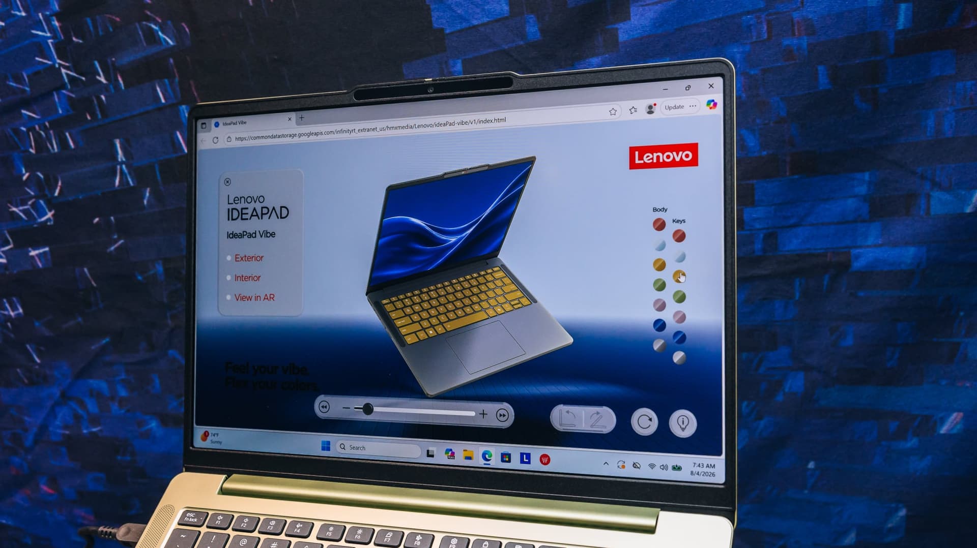 Lenovo IdeaPad Vibe on display with Lenovo Store and color options on screen